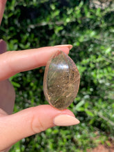 Load image into Gallery viewer, Copper Rutilated Smoky Quartz Swirl Carving