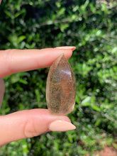 Load image into Gallery viewer, Copper Rutilated Smoky Quartz Swirl Carving