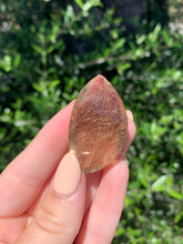 Load image into Gallery viewer, Copper Rutilated Smoky Quartz Swirl Carving