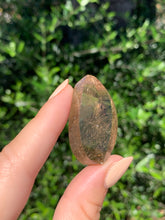 Load image into Gallery viewer, Copper Rutilated Smoky Quartz Swirl Carving