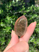 Load image into Gallery viewer, Copper Rutilated Smoky Quartz Swirl Carving