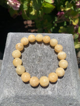 Load image into Gallery viewer, Orange Calcite Bracelet 12 mm